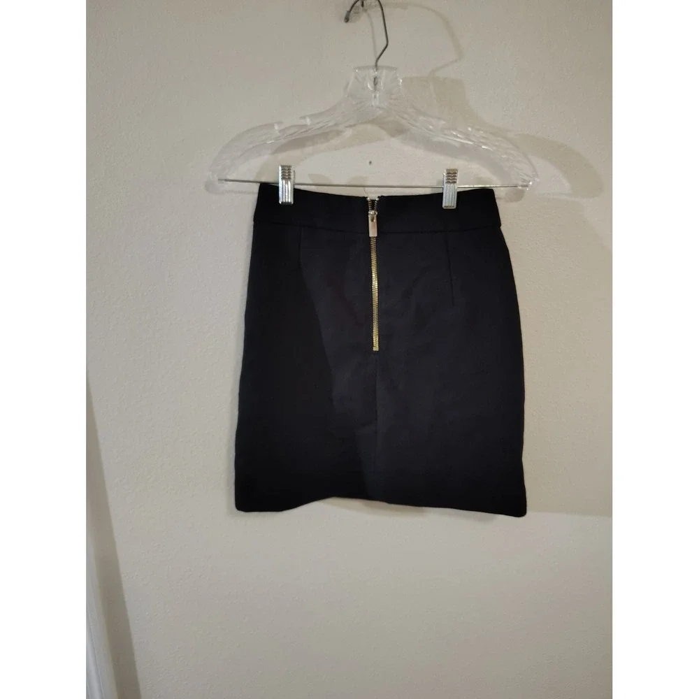 HM Black Mini‎ Skirt Front Pockets Gold Back Zipper Textured A-Line Size 4